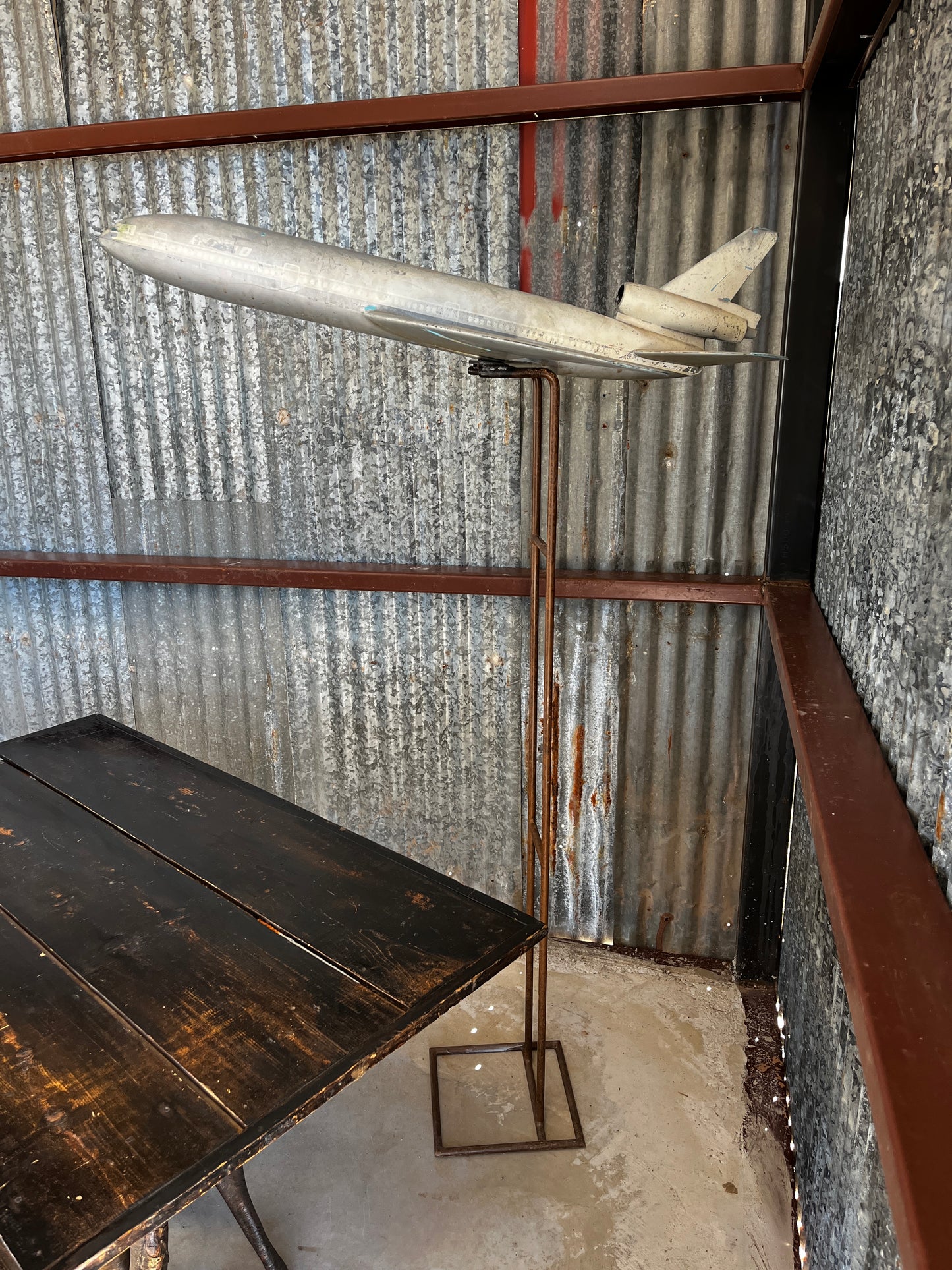 Boeing model plane on steel stand