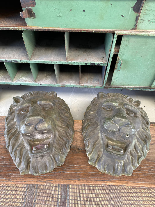 Pair of lion heads